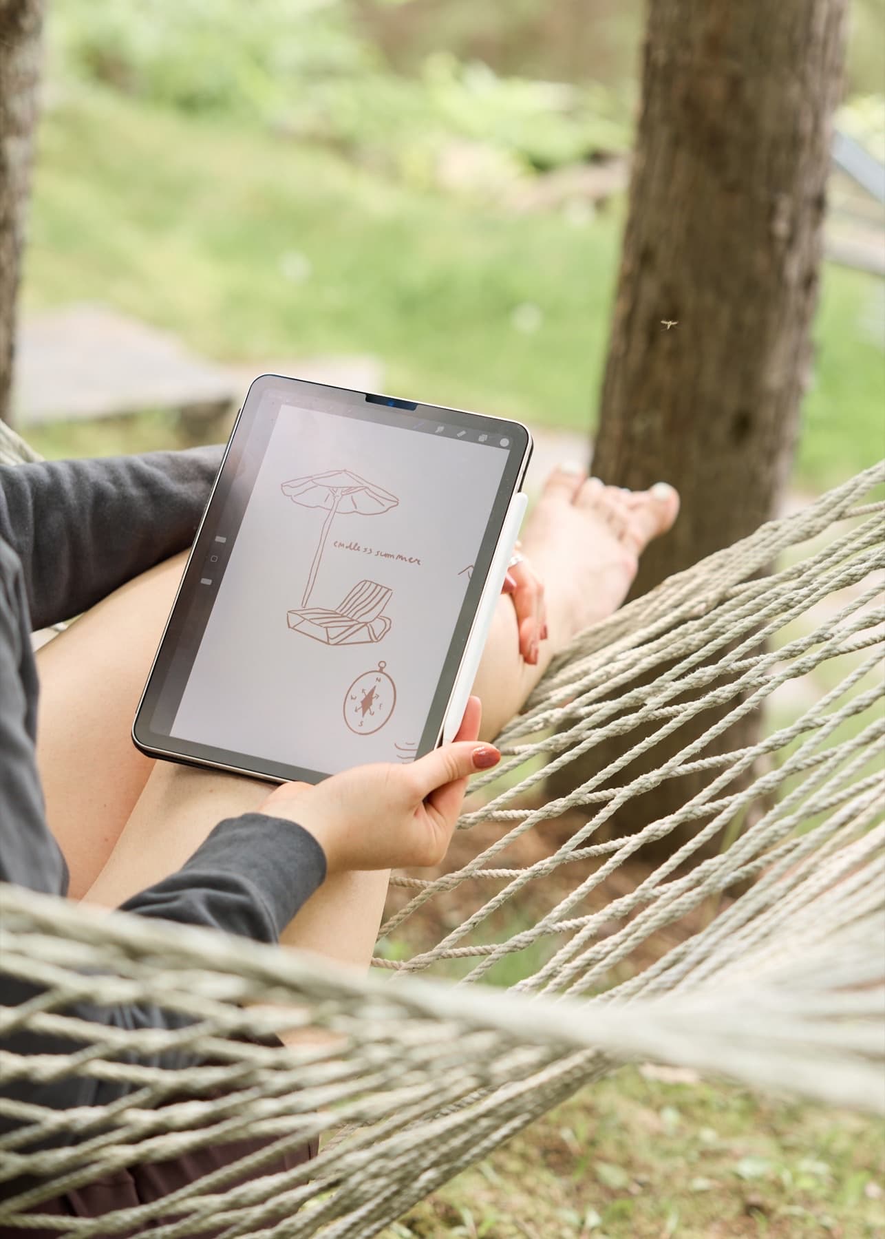 Sketching brand direction on tablet during Design