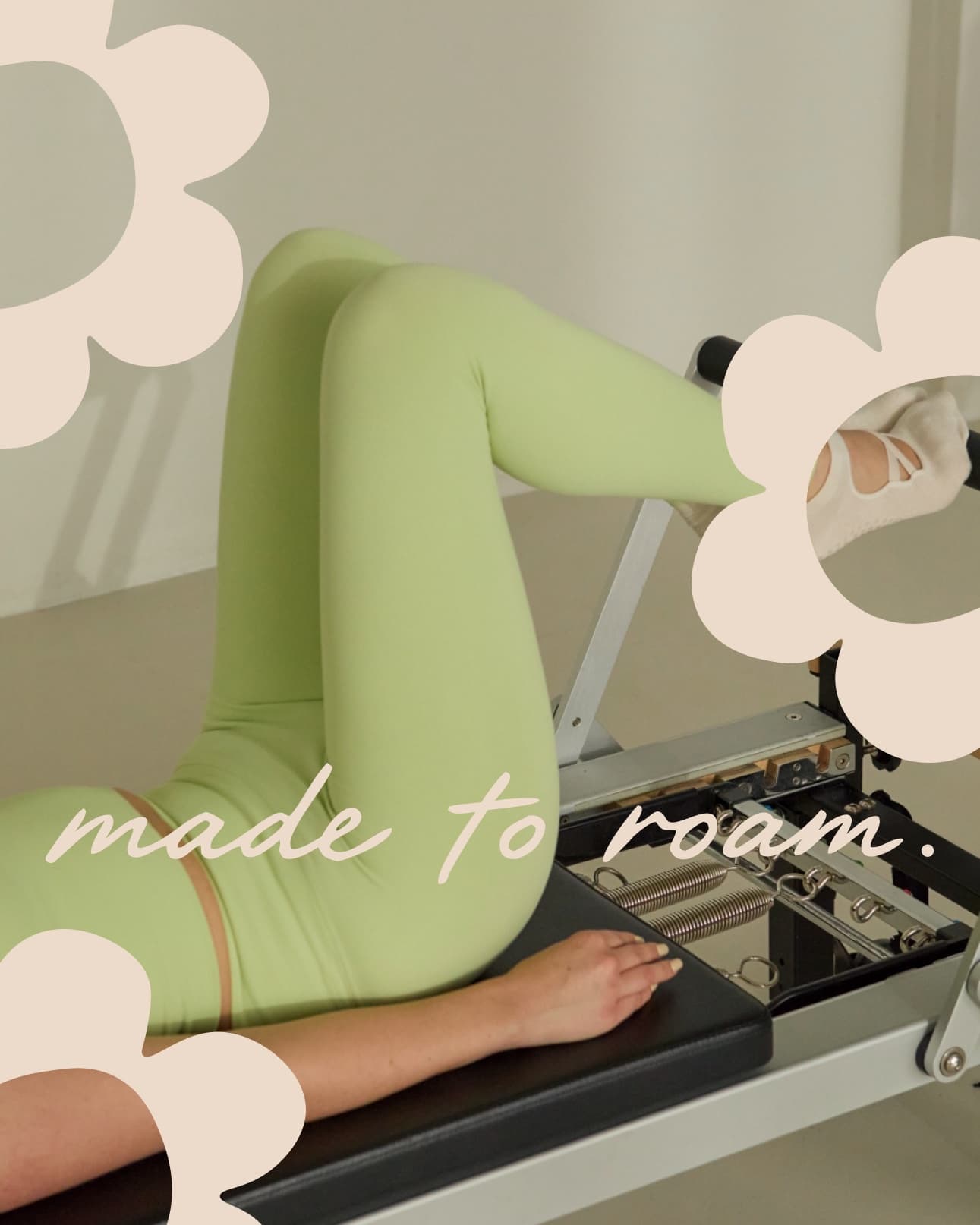 Wild Form made to roam campaign graphic layered over a green Pilates reformer image.