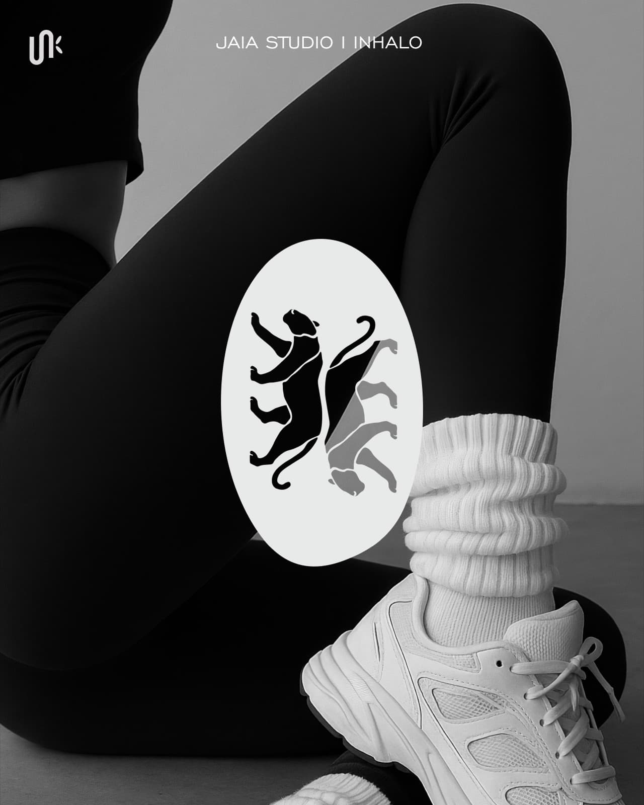 Inhalo Movement twin panther mark over black and white athletic footwear photography